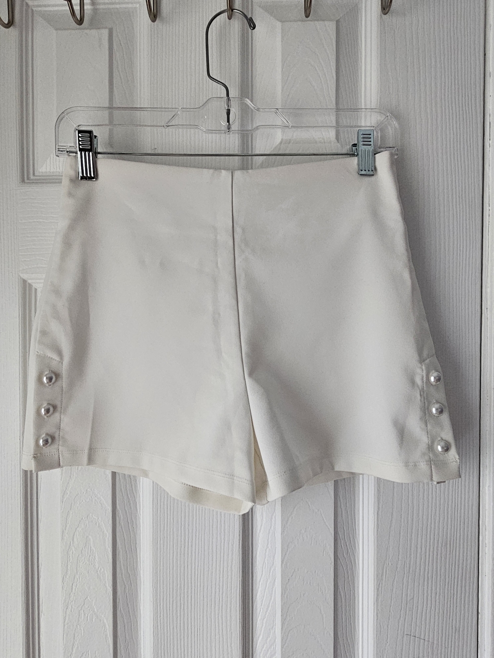 Have White High-Waist Shorts with Pearl Side Buttons